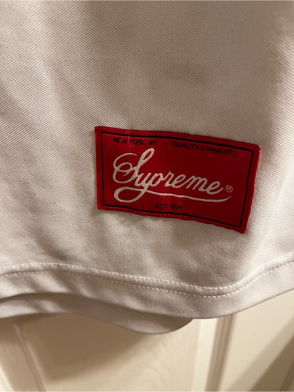 Supreme White Jersey with Teal Trim and Red Tag - Picture 3 of 4